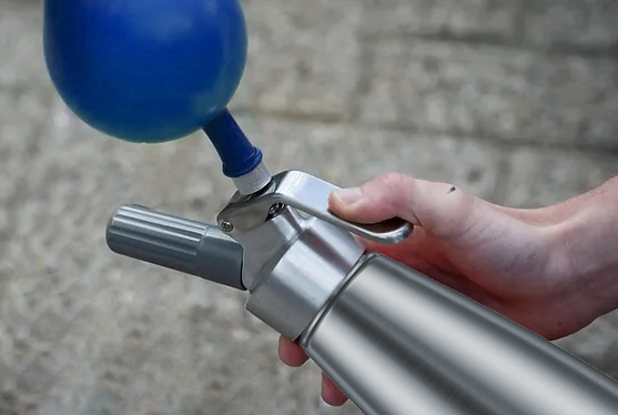 Cream dispenser in inflatable ball